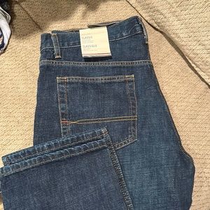 NWT Mens 34/30 Tommy Hilfiger jeans. Dark blue